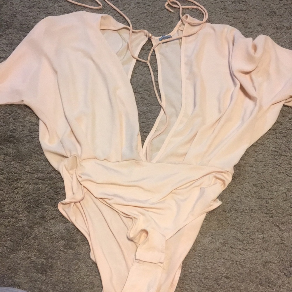 Deep deep V bodysuit perfect for a festival